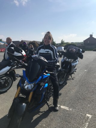 Here's Sue enjoying the sunshine on her lovely machine.